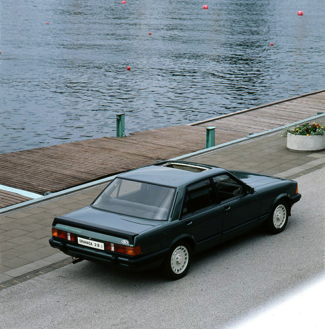 This archival image documents the 1981 Ford Granada 2.8i Mark II with water in background and is preserved in the Ford Heritage Vault as part of Ford Motor Company's historic photographic archive. Free for personal, non-commercial use. Ford Herita...