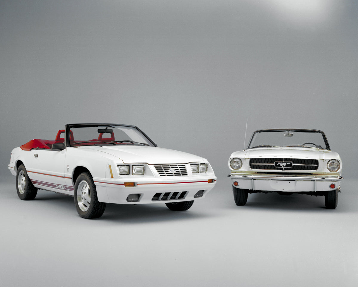 This archival image documents the 1984 Ford Mustang GT350 convertible and 1965 Mustang and is preserved in the Ford Heritage Vault as part of Ford Motor Company's historic photographic archive. Free for personal, non-commercial use. Ford Heritage ...