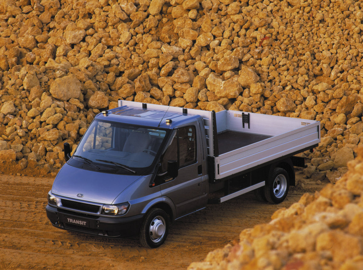 This archival image documents the 1999 Ford Transit MK III with truck bed modification and is preserved in the Ford Heritage Vault as part of Ford Motor Company's historic photographic archive. Free for personal, non-commercial use. Ford Heritage ...