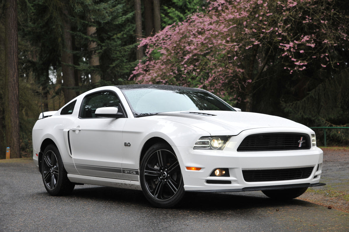 This archival image documents the 2013 Ford Mustang GT California Special with panoramic roof and is preserved in the Ford Heritage Vault as part of Ford Motor Company's historic photographic archive. Free for personal, non-commercial use. Ford He...