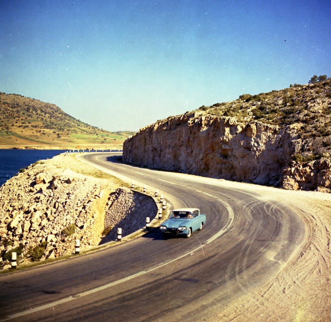 This archival image documents the 1961 Ford Classic and Consul 315 aerial view on scenic road in Greece and is preserved in the Ford Heritage Vault as part of Ford Motor Company's historic photographic archive. Free for personal, non-commercial us...