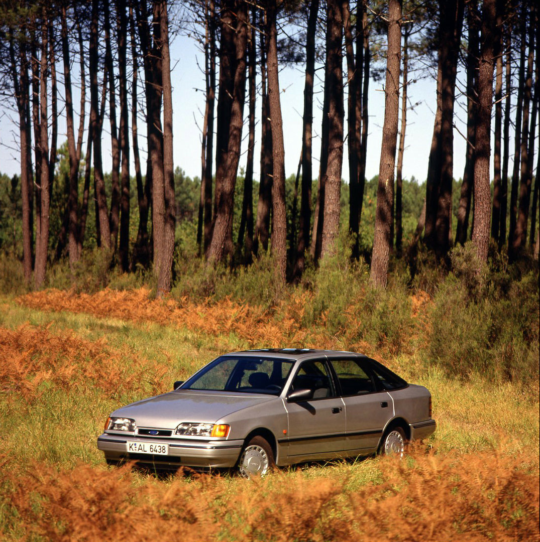 This archival image documents the 1989 Ford Scorpio Mark I in scenic field with trees and is preserved in the Ford Heritage Vault as part of Ford Motor Company's historic photographic archive. Free for personal, non-commercial use. Ford Heritage V...