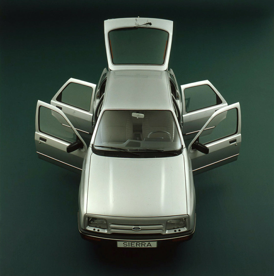 This archival image documents the 1982 Ford Sierra 2.0 GL Mark I LHD with all doors open in studio and is preserved in the Ford Heritage Vault as part of Ford Motor Company's historic photographic archive. Free for personal, non-commercial use. Fo...