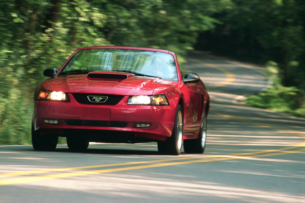 This archival image documents the 2001 Ford Mustang GT convertible and is preserved in the Ford Heritage Vault as part of Ford Motor Company's historic photographic archive. Free for personal, non-commercial use. Ford Heritage Vault reference AR-2...