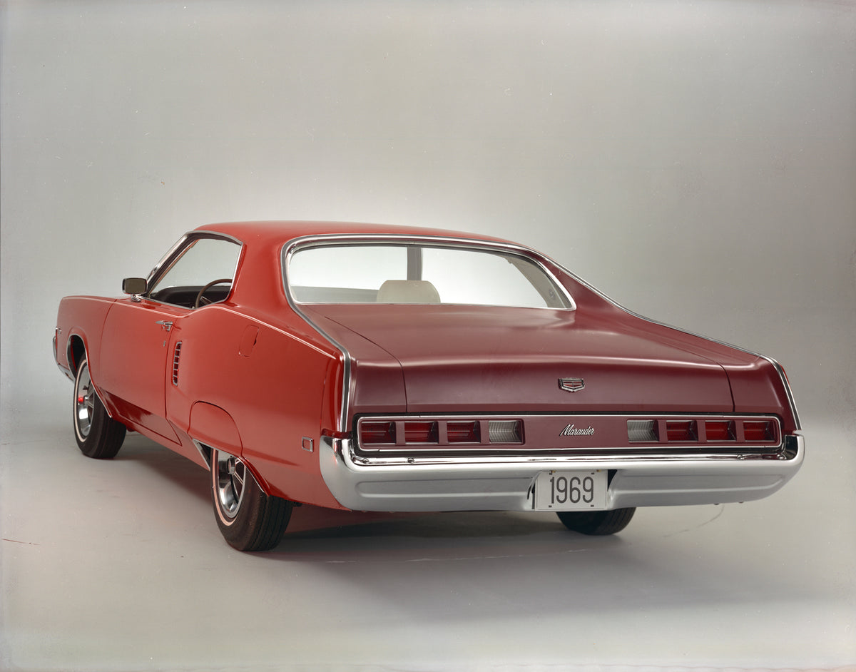 This archival image documents the 1969 Mercury Marauder X-100 Two-Door Hardtop and is preserved in the Ford Heritage Vault as part of Ford Motor Company's historic photographic archive. Free for personal, non-commercial use. Ford Heritage Vault re...
