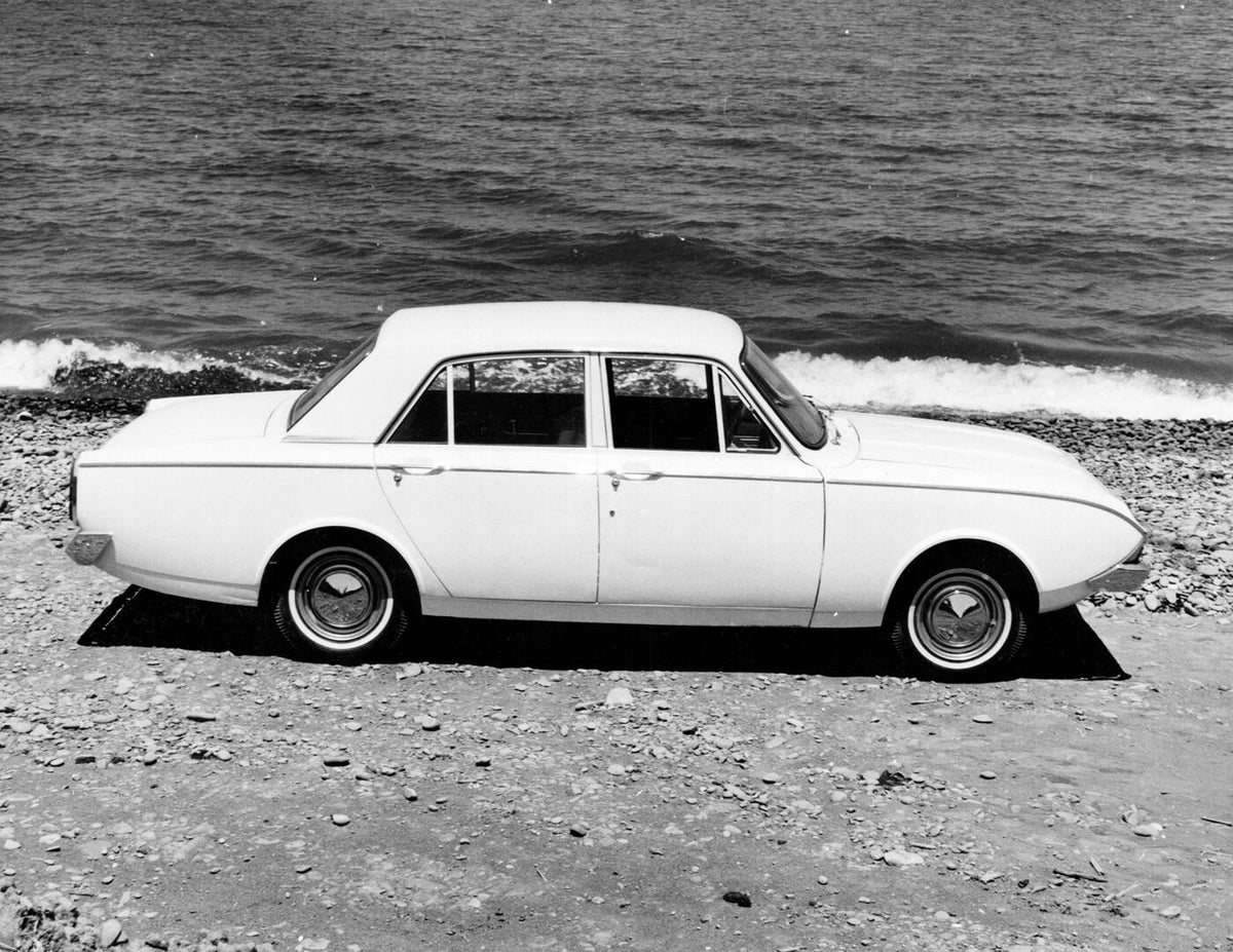 This archival image documents the 1964 Ford Consul Corsair side view on scenic beach AR-2007-5-134 and is preserved in the Ford Heritage Vault as part of Ford Motor Company's historic photographic archive. Free for personal, non-commercial use. Fo...