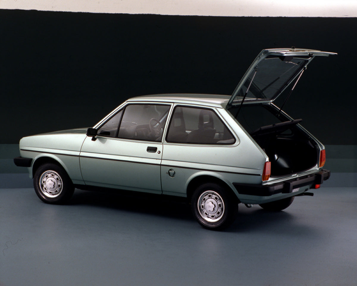 This archival image documents the 1981 Ford Fiesta Mark I rear view in studio with open trunk and is preserved in the Ford Heritage Vault as part of Ford Motor Company's historic photographic archive. Free for personal, non-commercial use. Ford He...