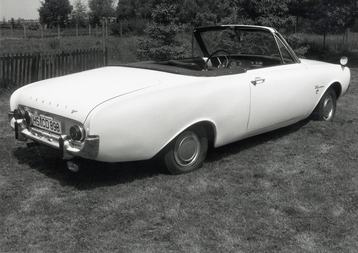 This archival image documents the 1964 Ford Taunus 17 M TS rear view in scenic field and is preserved in the Ford Heritage Vault as part of Ford Motor Company's historic photographic archive. Free for personal, non-commercial use. Ford Heritage Va...