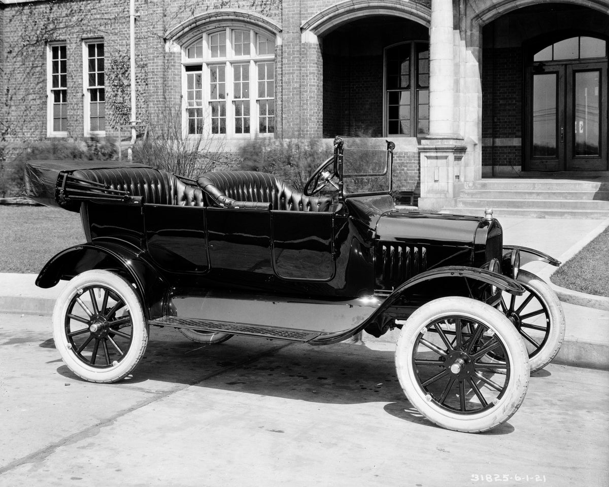 This archival image documents the 1921 Ford Model T Touring Car and is preserved in the Ford Heritage Vault as part of Ford Motor Company's historic photographic archive. Free for personal, non-commercial use. Ford Heritage Vault reference AR-2008...