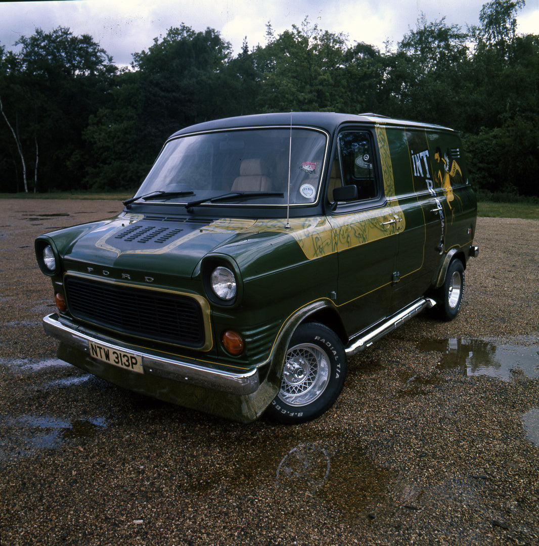 This archival image documents the 1976 Ford Transit Mark I Custom Street Transit Van front view in scenic field and is preserved in the Ford Heritage Vault as part of Ford Motor Company's historic photographic archive. Free for personal, non-comme...