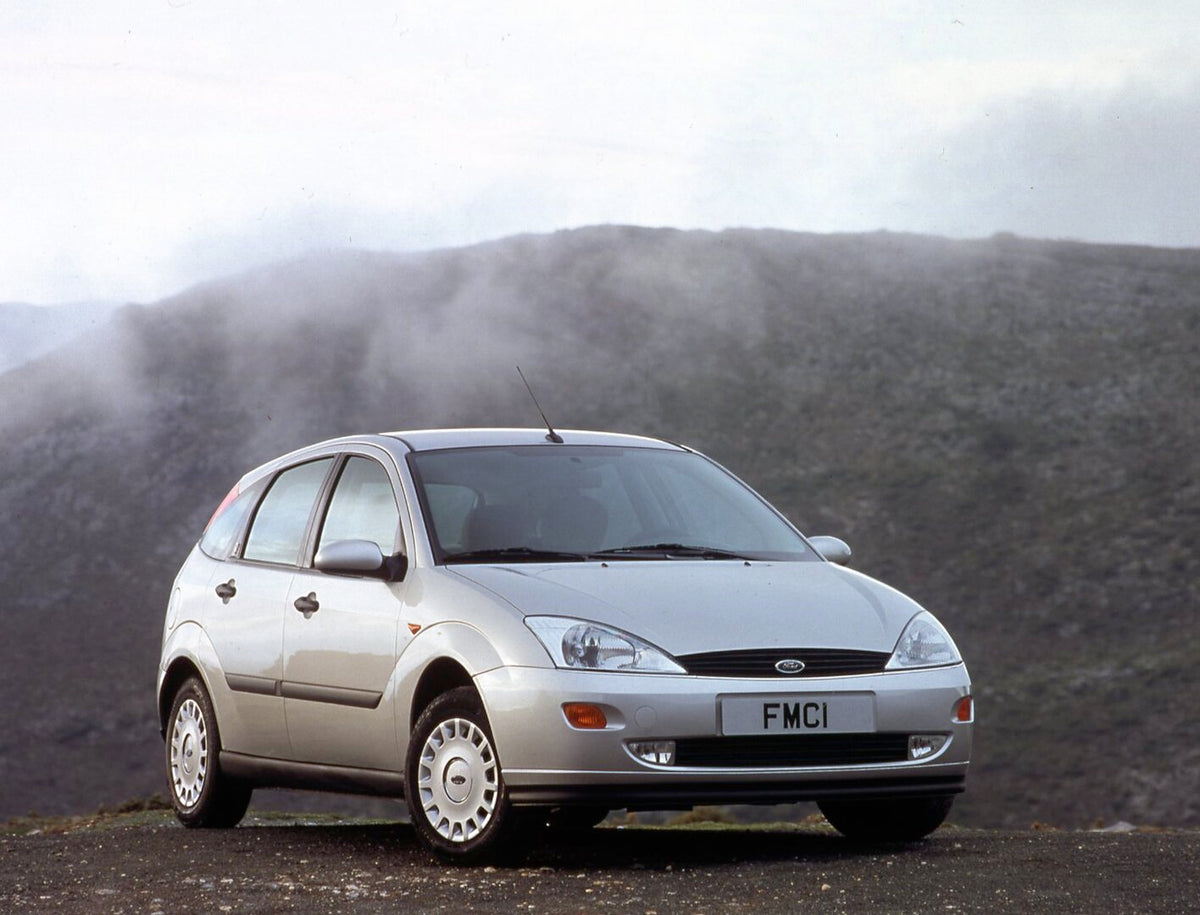 This archival image documents the 2001 Ford Focus Mark I in mountains with scenic fog and is preserved in the Ford Heritage Vault as part of Ford Motor Company's historic photographic archive. Free for personal, non-commercial use. Ford Heritage V...