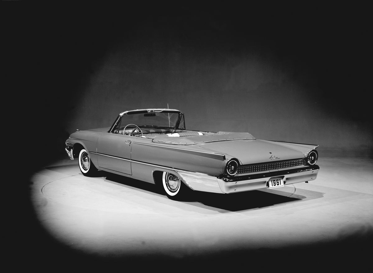 This archival image documents the 1961 Ford Galaxie Sunliner convertible and is preserved in the Ford Heritage Vault as part of Ford Motor Company's historic photographic archive. Free for personal, non-commercial use. Ford Heritage Vault referenc...