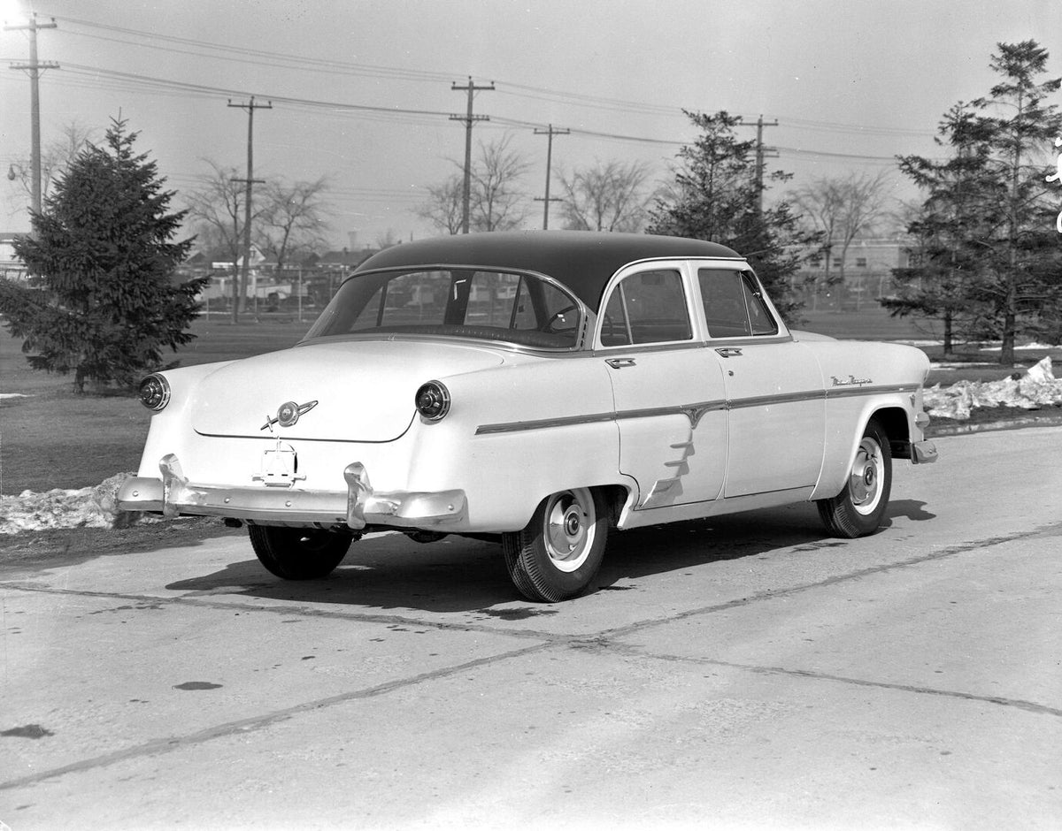 This archival image documents the 1954 Meteor Niagara Sedan rear view on scenic road with trees AR-2007-5 and is preserved in the Ford Heritage Vault as part of Ford Motor Company's historic photographic archive. Free for personal, non-commercial ...