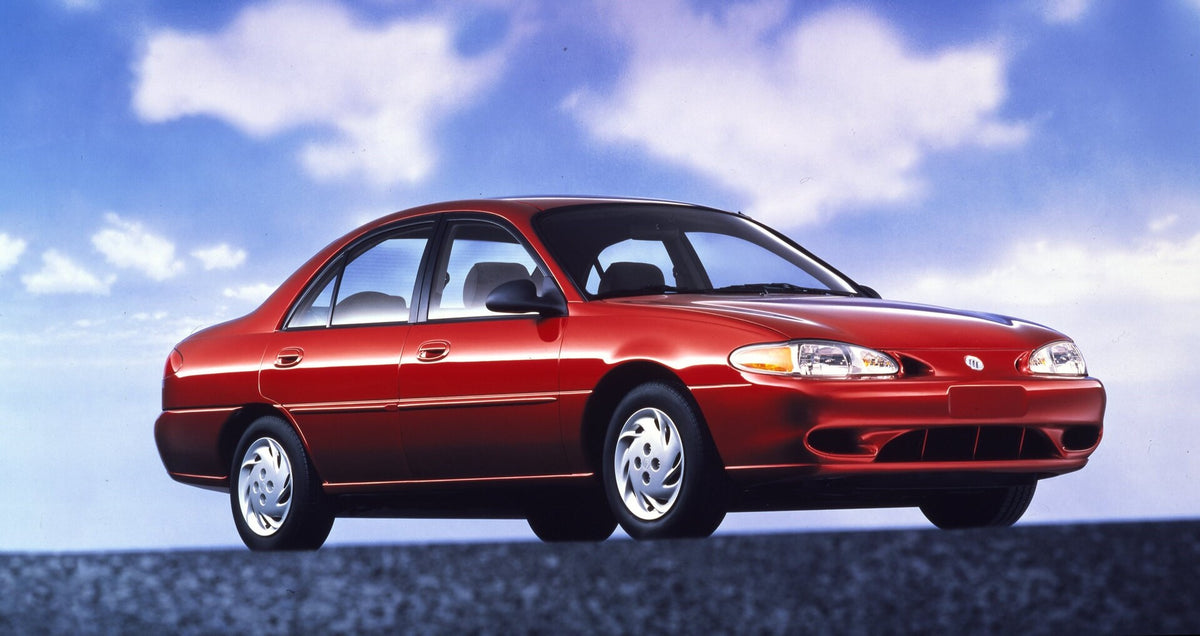 This archival image documents the 1997 Mercury Tracer front angle with clouds in background CN325013-002 and is preserved in the Ford Heritage Vault as part of Ford Motor Company's historic photographic archive. Free for personal, non-commercial u...