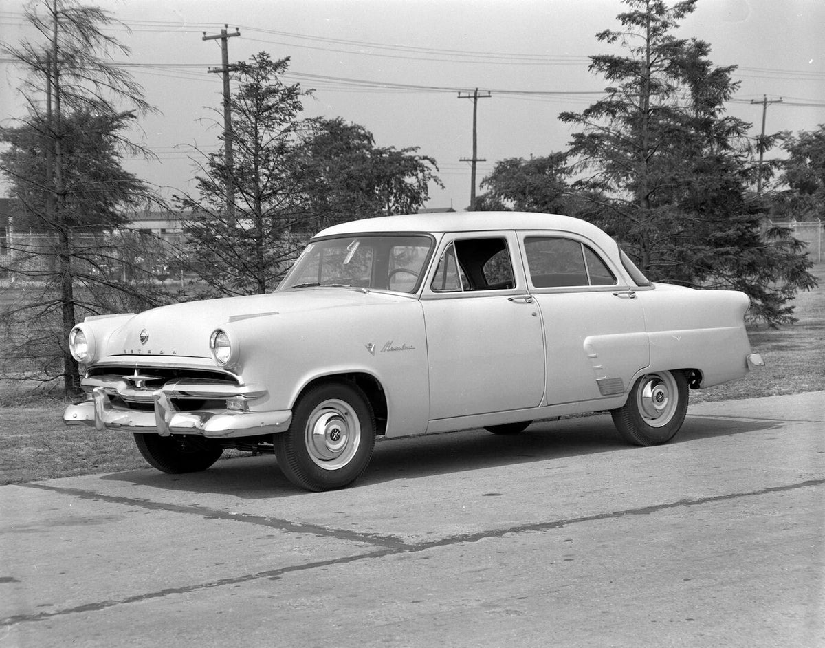 This archival image documents the 1953 Meteor Mainline Sedan on scenic road AR-2007-5 and is preserved in the Ford Heritage Vault as part of Ford Motor Company's historic photographic archive. Free for personal, non-commercial use. Ford Heritage V...