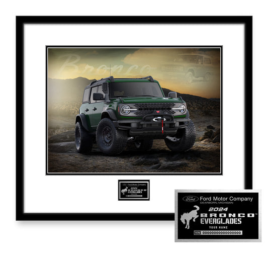 A framed and matted print featuring a green 2024 Bronco Everglades vehicle, with a sunset background. The image includes the Ford Motor Company logo and a badge for Ford Images.