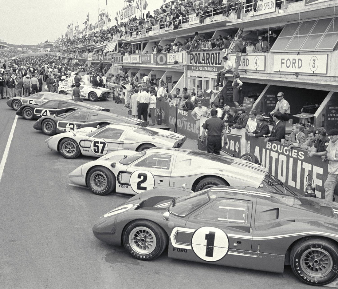 Ford Mk IV No. 1 and No. 2 lead the Ford line-up along the pit lane at the 1967 24 Hours of Le Mans. Archive reference 0001-4708.