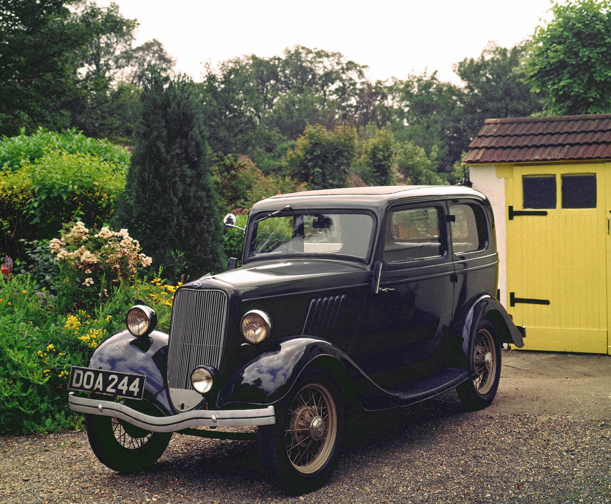 1933 Ford Model Y Front 3/4 View in Garden 0033-0015