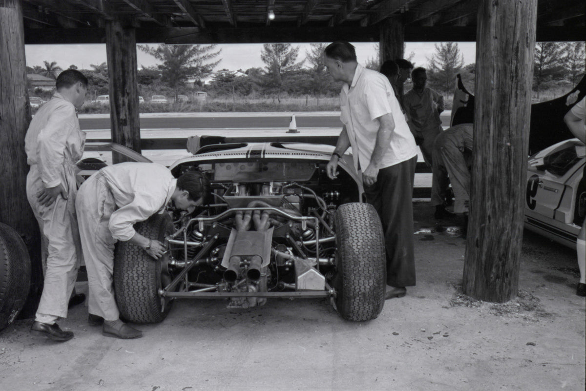 1964 Mechanics working on race car — Nassau — 0064-0048