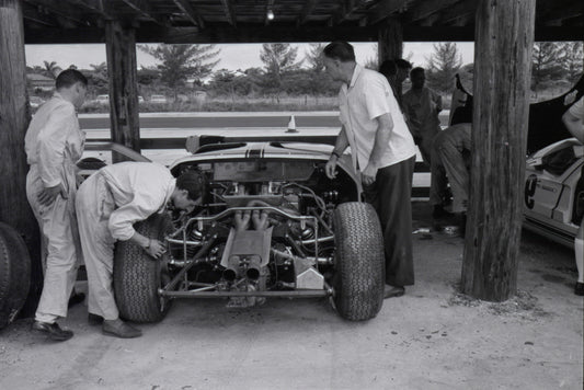 1964 Mechanics working on race car — Nassau — 0064-0048