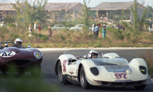 1965 Sports cars racing through a corner — Nassau — 0065-0002