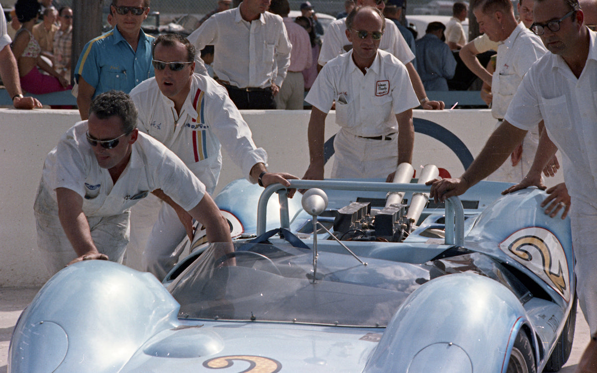 1965 Crew preparing Ford-powered race car — Nassau — 0065-0017