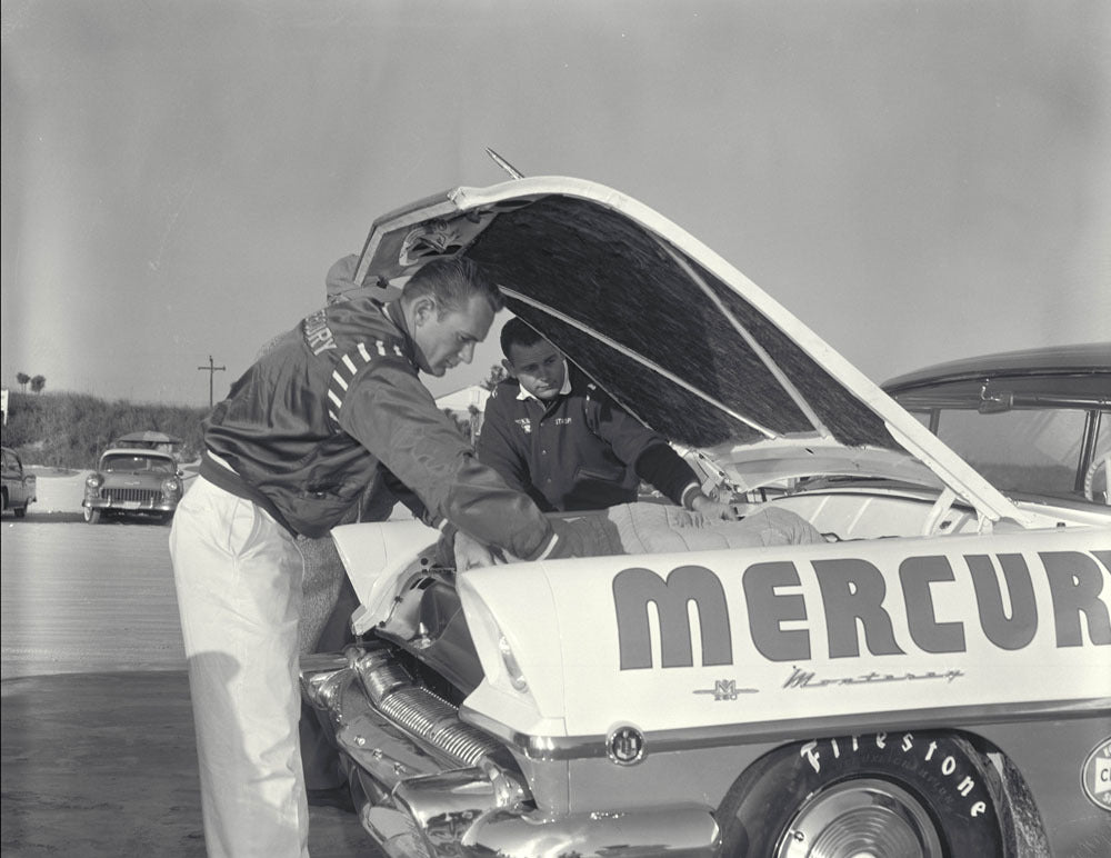 1956 NASCAR Daytona Beach Speed Weeks Florida Vern Houle and Bill Stroppe looking at engine of a Mercury CD 1098 3282 4909 14 0144-0713