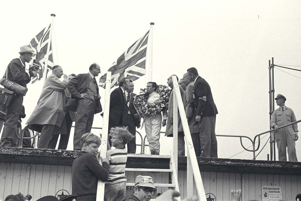 1967 Dutch Grand Prix Assen Netherlands Jim Clark on the victory rostrum CD 0554 3252 2911 9 0144-1000