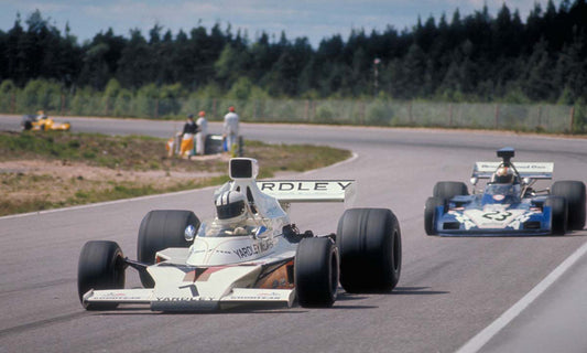 1973 Swedish Grand Prix Sweden Race winner Denis Hulme leads the pack in his McLaren M23 CD 0776 3301 3813 118 0144-1247