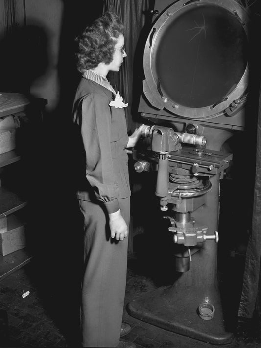 1943 Aircraft Building woman inspecting component 0400-8967