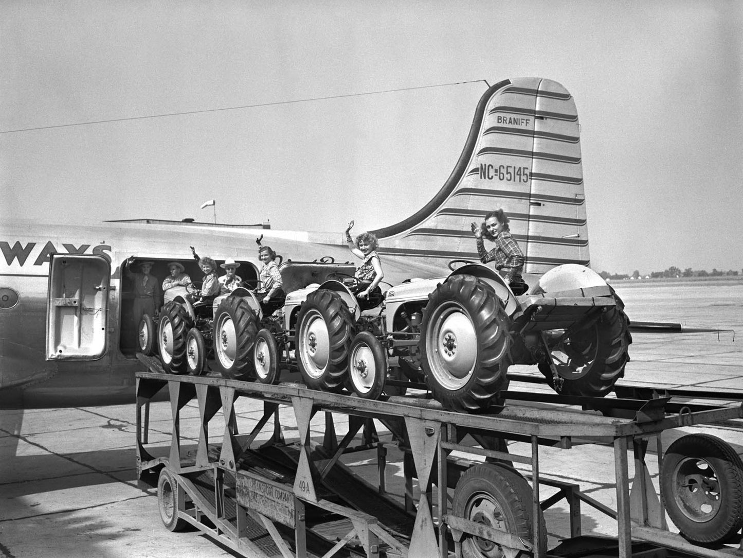 1947 Ford Tractors loading for first air shipment  0400-9040