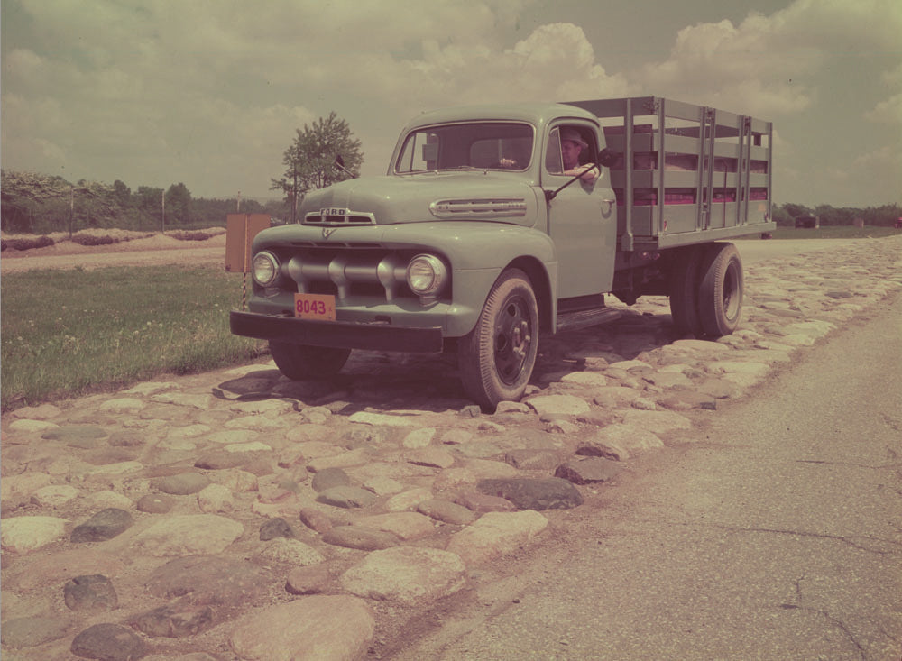 1951 Ford F 5 stake truck on test track 0401-1440