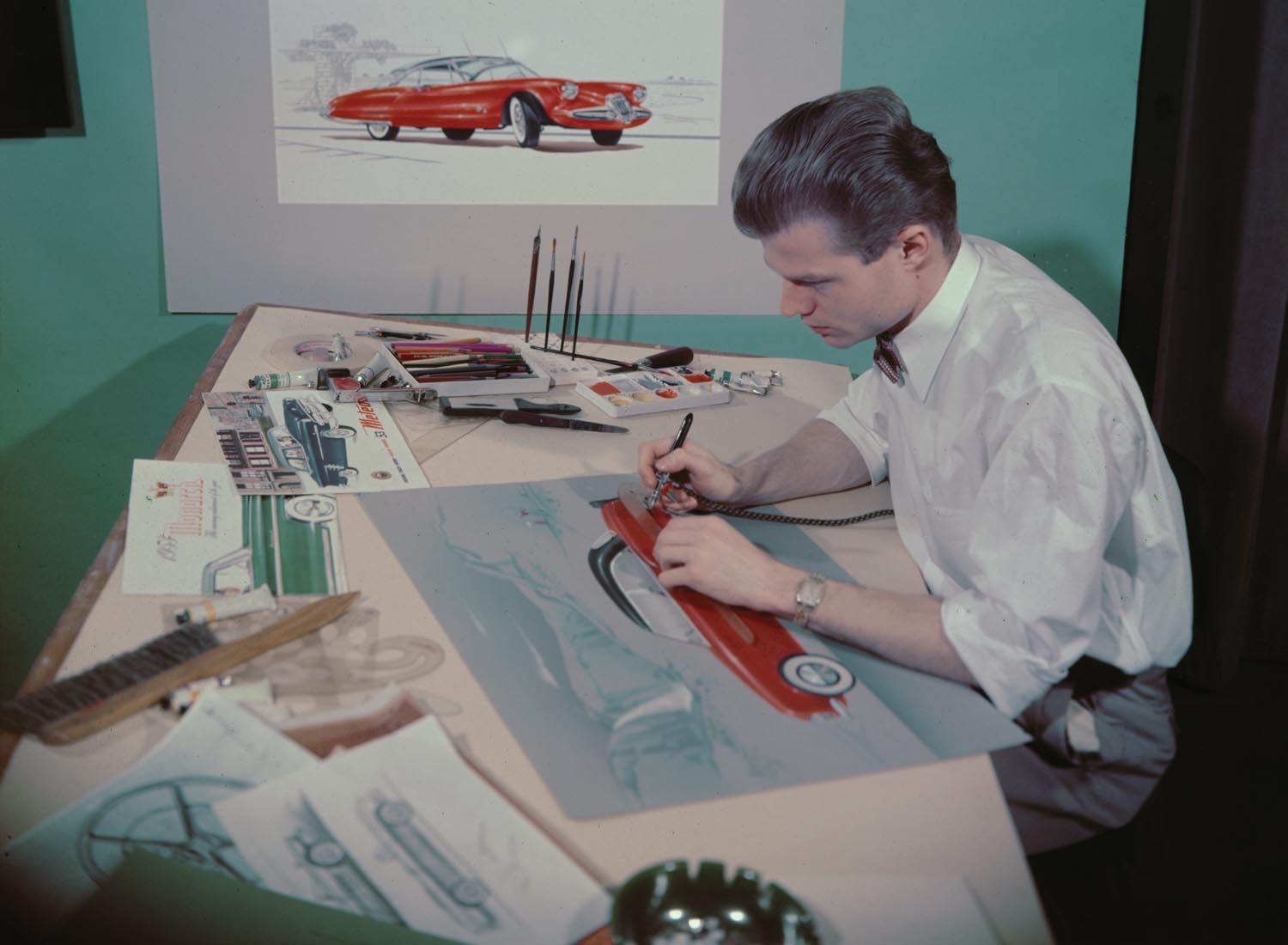 1953 Ford Styling Studio airbrushing a rendering  0401-1524