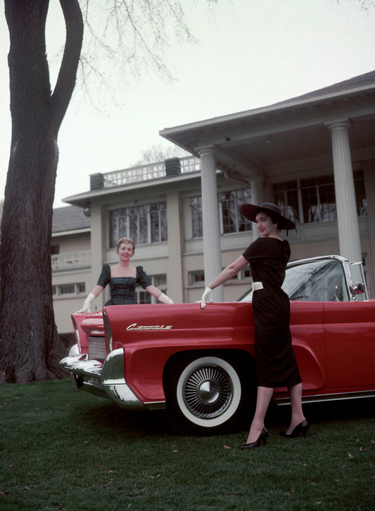 1958 Lincoln Continental MkIII with women in Train 0401-7077