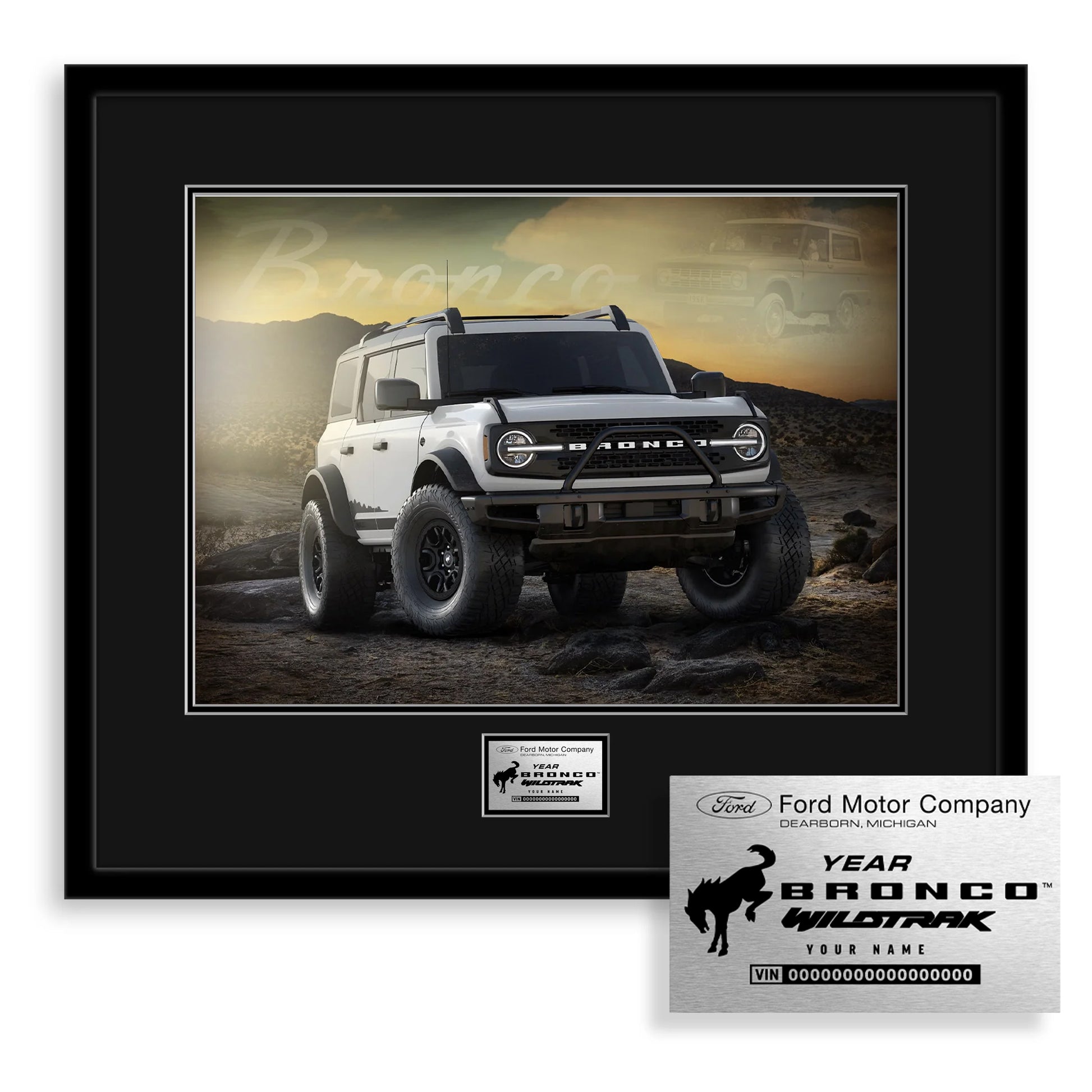 Framed photo of a white Ford Bronco SUV with a personalized plaque on a white background