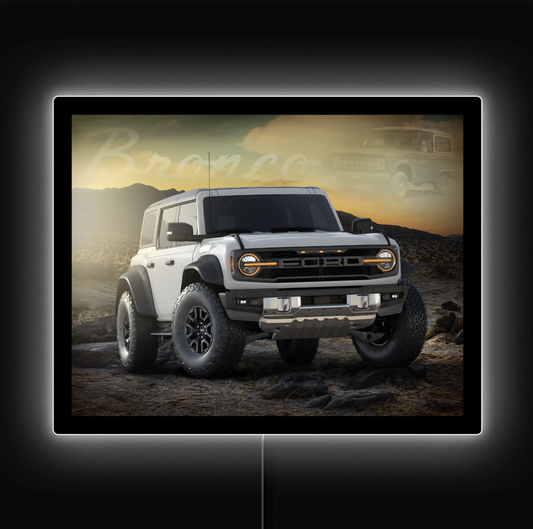 Ford Bronco SUV displayed on a screen with a scenic background