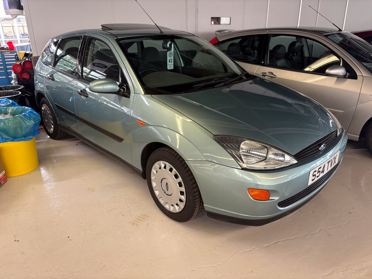 This archival image documents the 1998 Ford Focus Mk I LX and is preserved in the Ford Heritage Vault as part of Ford Motor Company's historic photographic archive. Free for personal, non-commercial use. Ford Heritage Vault reference AR-2024-9.4.54.