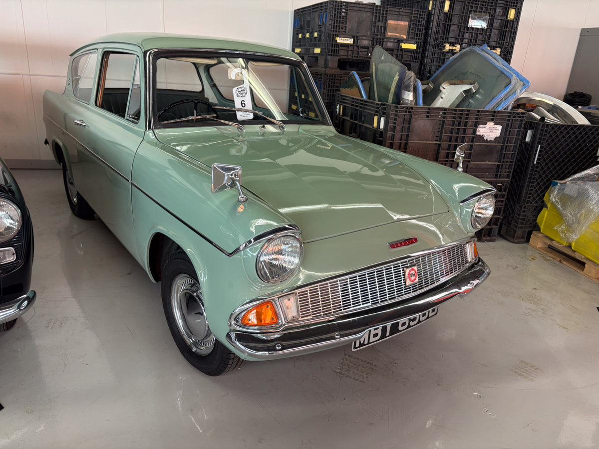 This archival image documents the 1966 Ford Anglia 105E and is preserved in the Ford Heritage Vault as part of Ford Motor Company's historic photographic archive. Free for personal, non-commercial use. Ford Heritage Vault reference AR-2024-9.4.8.