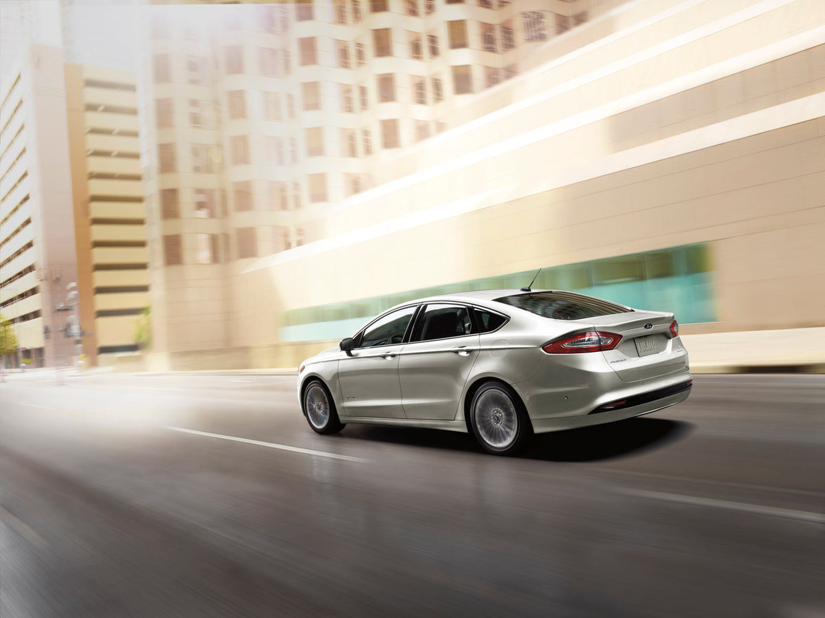 This archival image documents the 2015 Ford Fusion Hybrid action shot in city and is preserved in the Ford Heritage Vault as part of Ford Motor Company's historic photographic archive. Free for personal, non-commercial use. Ford Heritage Vault ref...