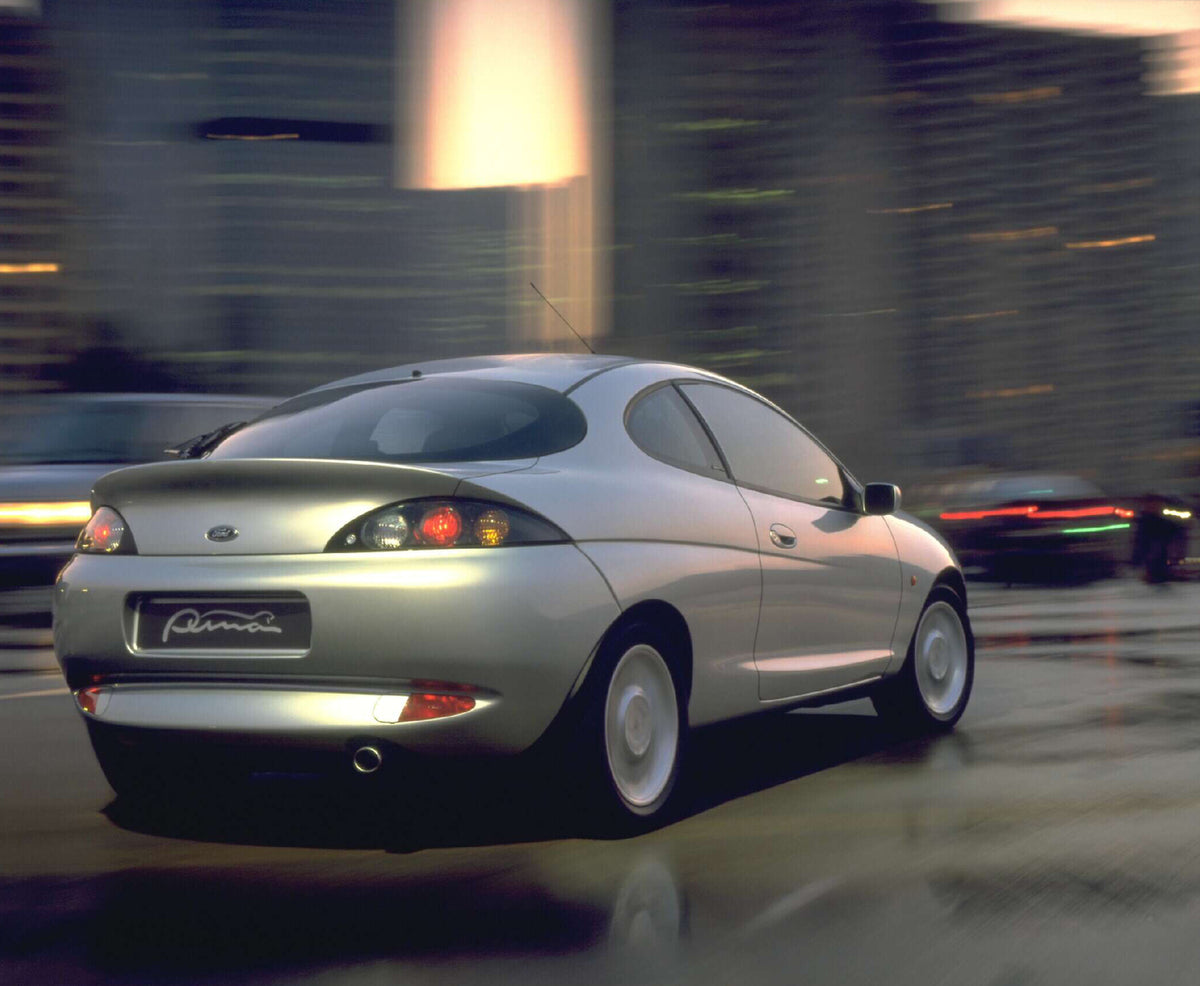 This archival image documents the 1997 Ford Puma rear view action shot in city AR-2002-213709 and is preserved in the Ford Heritage Vault as part of Ford Motor Company's historic photographic archive. Free for personal, non-commercial use. Ford He...