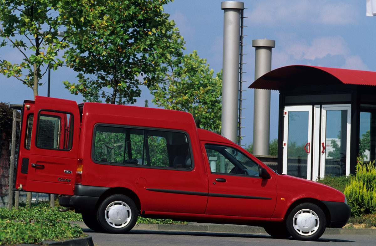 This archival image documents the 1998 Heritage Archive - 1996 Ford Fiesta Mark IV Van side view with open back doors and is preserved in the Ford Heritage Vault as part of Ford Motor Company's historic photographic archive. Free for personal, non...