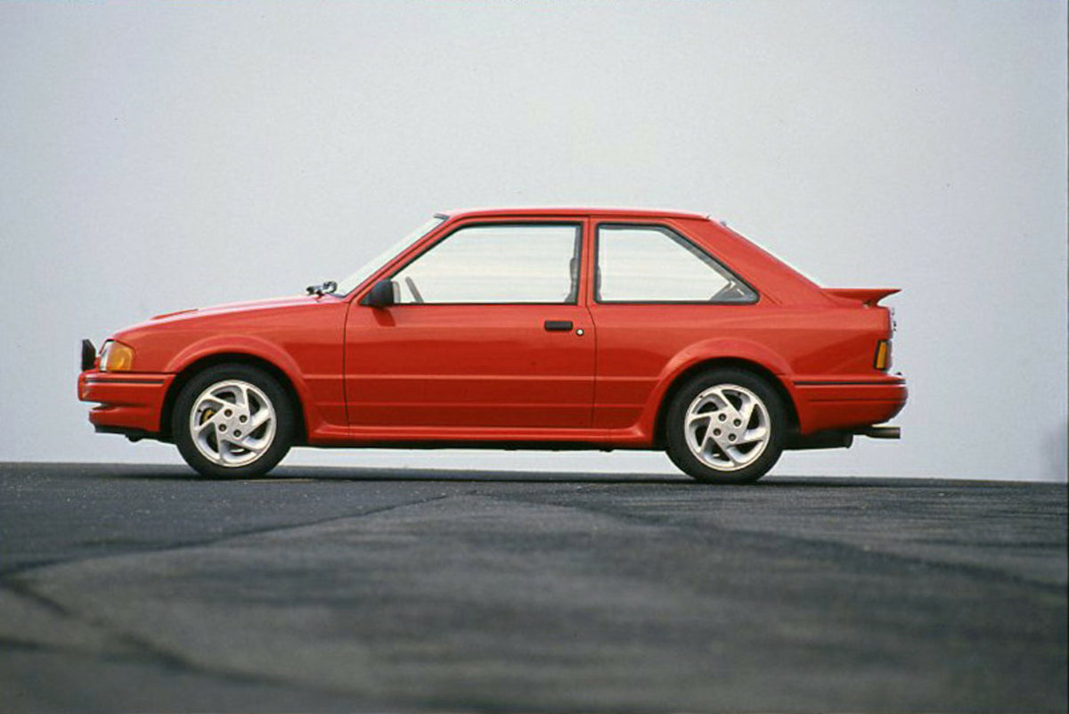 This archival image documents the 1986 Ford Escort Mark IV Turbo LHD side view on road and is preserved in the Ford Heritage Vault as part of Ford Motor Company's historic photographic archive. Free for personal, non-commercial use. Ford Heritage ...