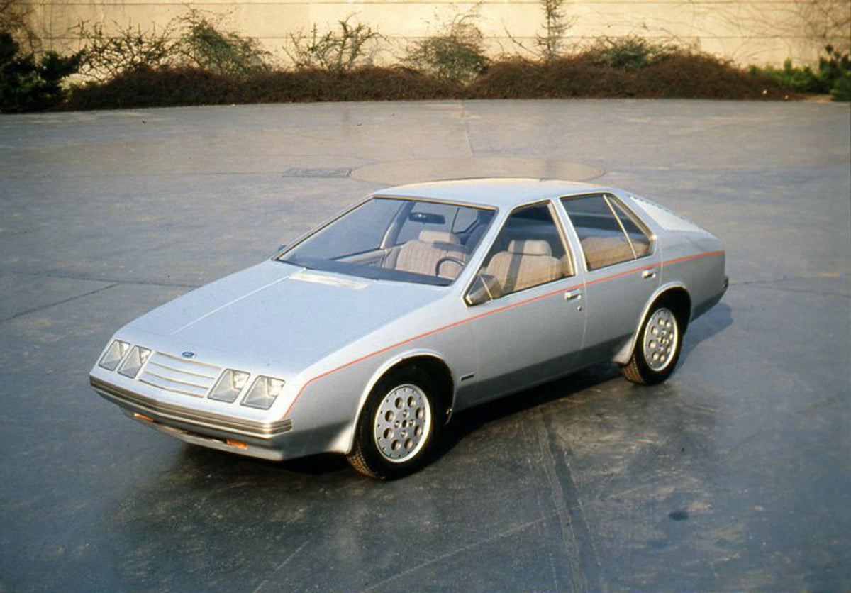 This archival image documents the 1980 Ford Probe II front angled view in parking lot and is preserved in the Ford Heritage Vault as part of Ford Motor Company's historic photographic archive. Free for personal, non-commercial use. Ford Heritage V...