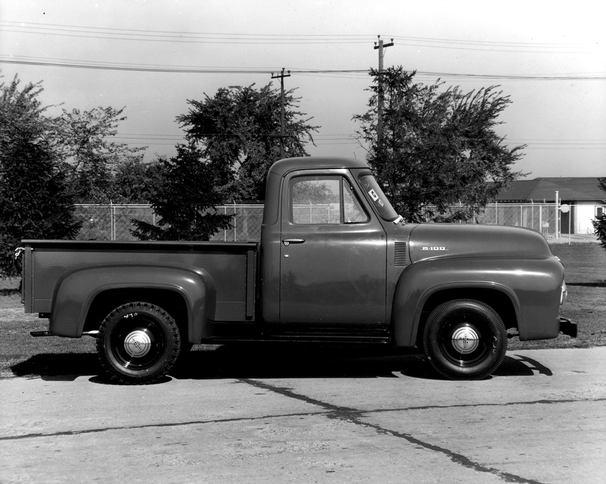 This archival image documents the 1953 Mercury M-100 Pickup side view on scenic road AR-2007-5 and is preserved in the Ford Heritage Vault as part of Ford Motor Company's historic photographic archive. Free for personal, non-commercial use. Ford H...