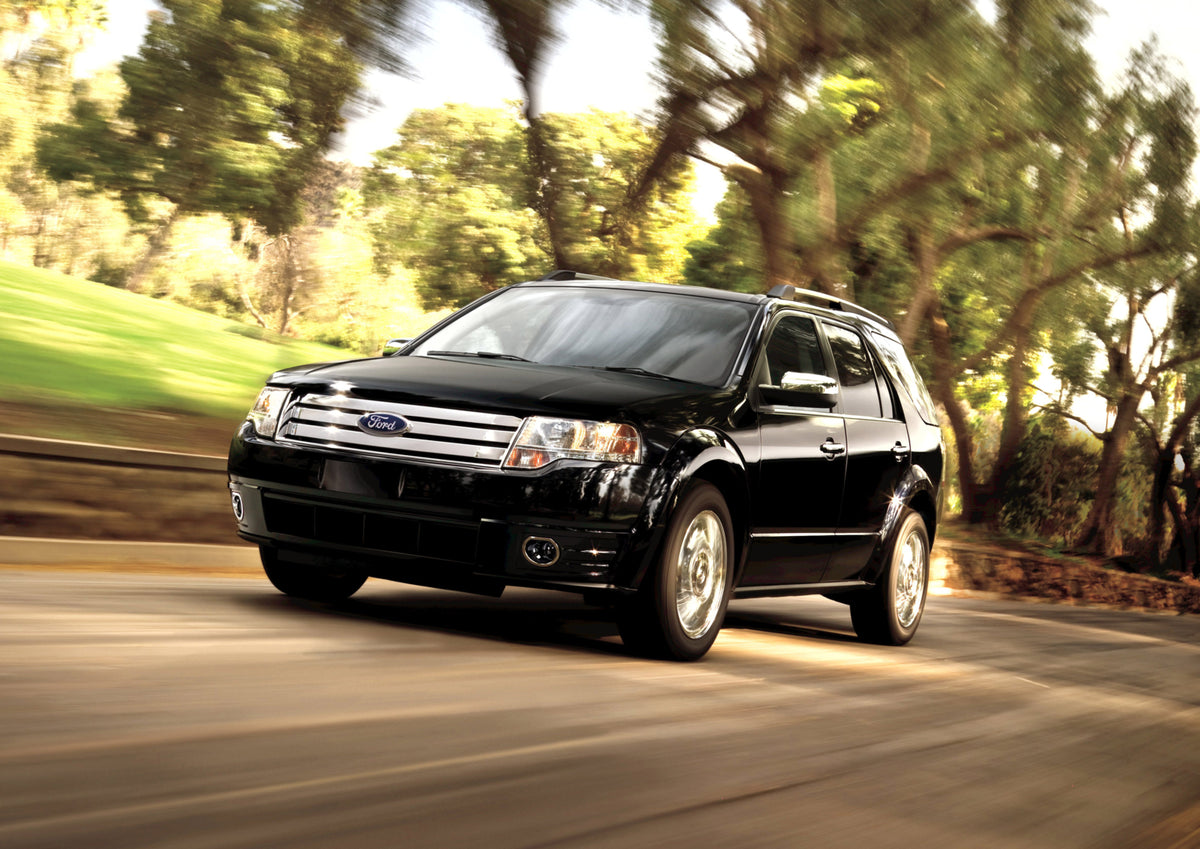 This archival image documents the 2009 Ford Taurus X action shot on scenic road MS8851 and is preserved in the Ford Heritage Vault as part of Ford Motor Company's historic photographic archive. Free for personal, non-commercial use. Ford Heritage ...
