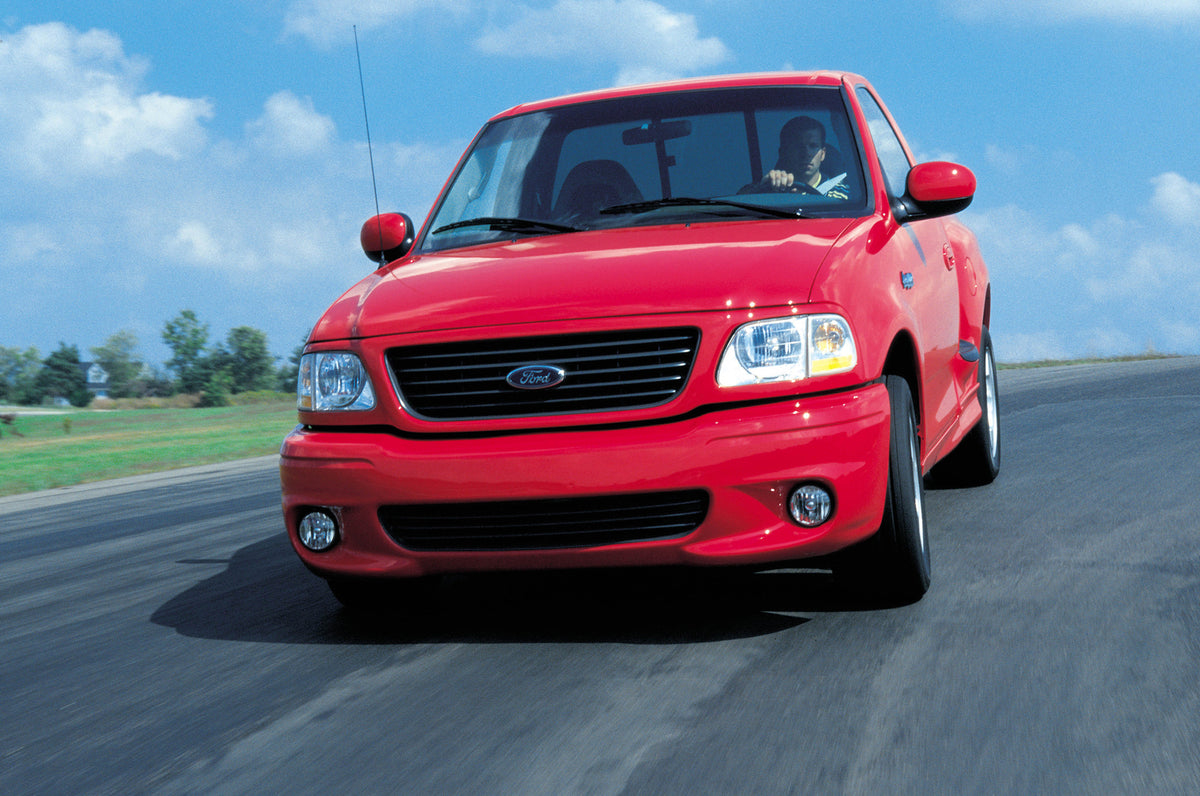 This archival image documents the 2001 Ford F-150 SVT Lightning pickup truck and is preserved in the Ford Heritage Vault as part of Ford Motor Company's historic photographic archive. Free for personal, non-commercial use. Ford Heritage Vault refe...