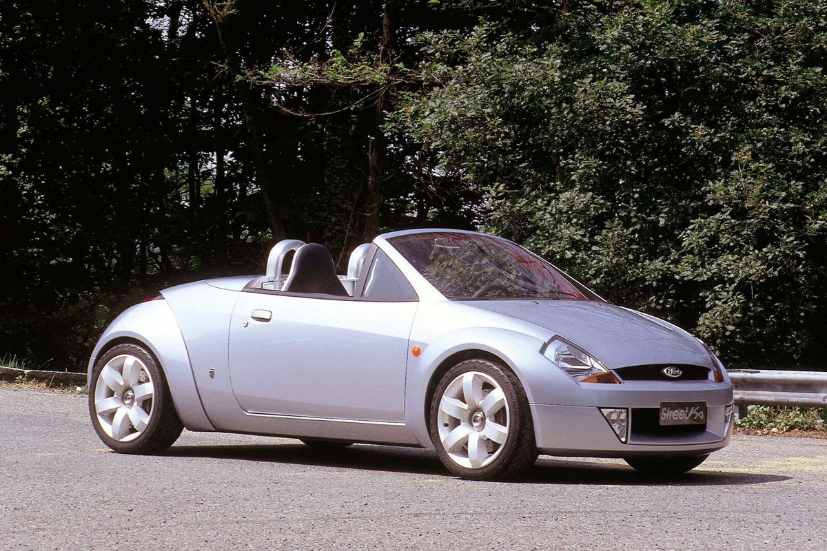 This archival image documents the 2002 Ford Ka Mark I on scenic road and is preserved in the Ford Heritage Vault as part of Ford Motor Company's historic photographic archive. Free for personal, non-commercial use. Ford Heritage Vault reference AR...