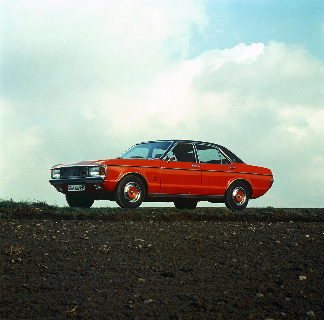 This archival image documents the 1974 Ford Granada Mark I Ghia low view on dirt road and is preserved in the Ford Heritage Vault as part of Ford Motor Company's historic photographic archive. Free for personal, non-commercial use. Ford Heritage V...