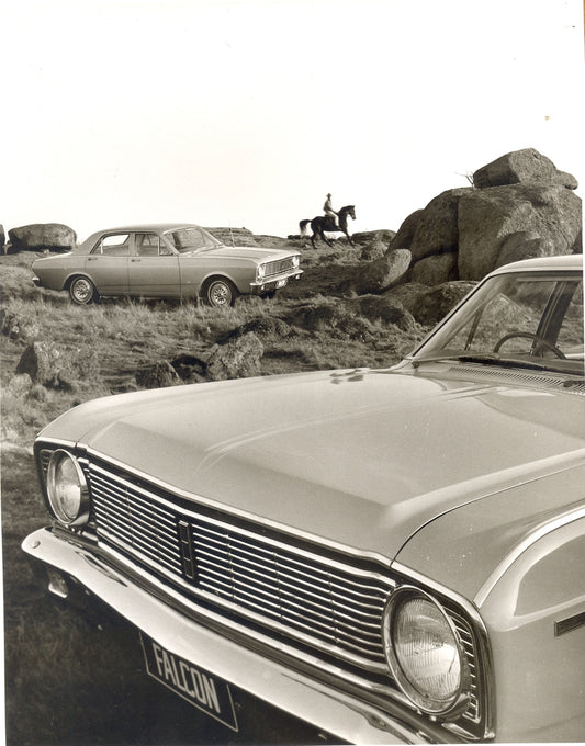 1966 Ford XR Falcon Sedans in scenic rocky area with person on horse in distance HV 1966-0147
