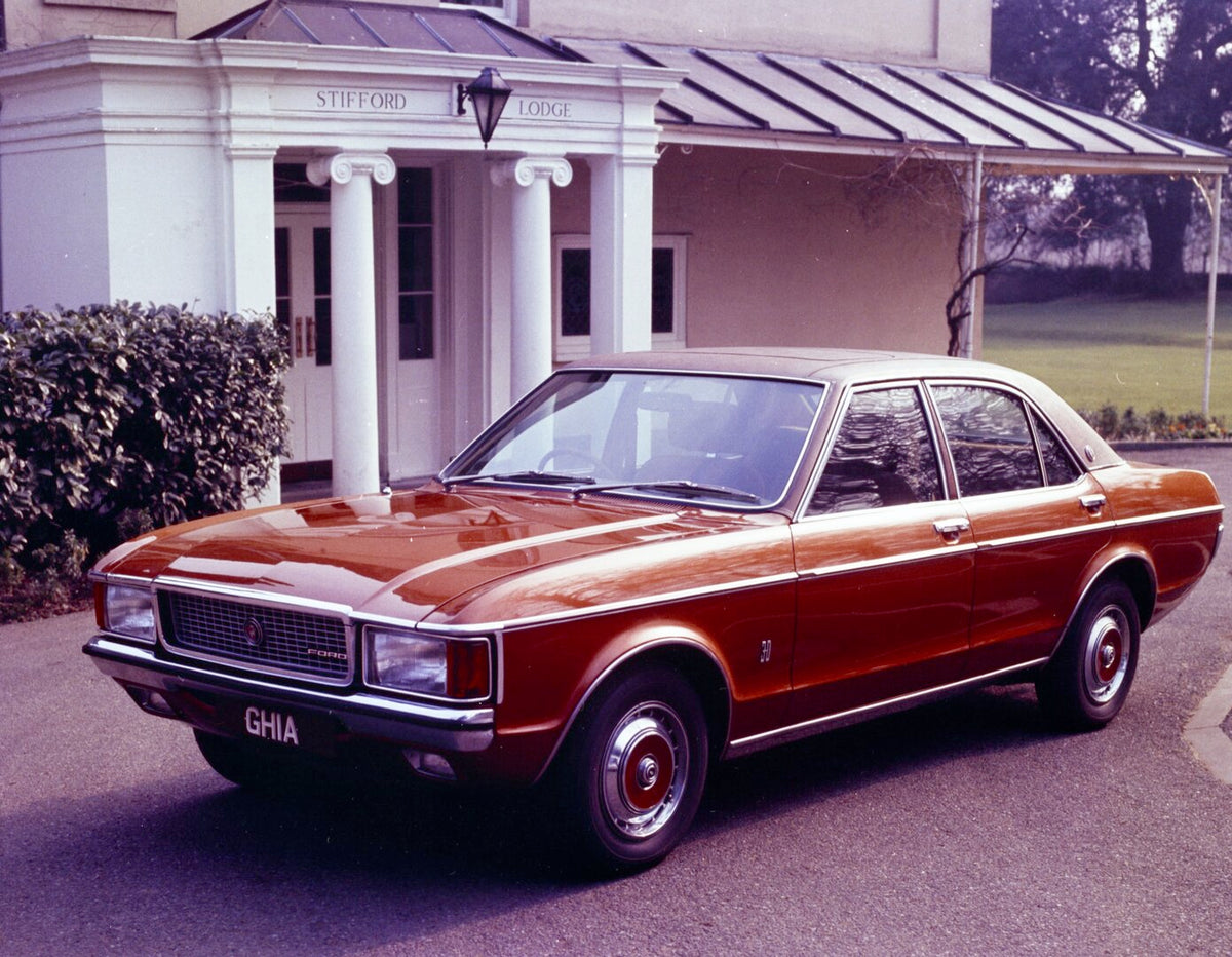 This archival image documents the 1974 Ford Granada Mark I Ghia in front of Stifford Lodge and is preserved in the Ford Heritage Vault as part of Ford Motor Company's historic photographic archive. Free for personal, non-commercial use. Ford Herit...